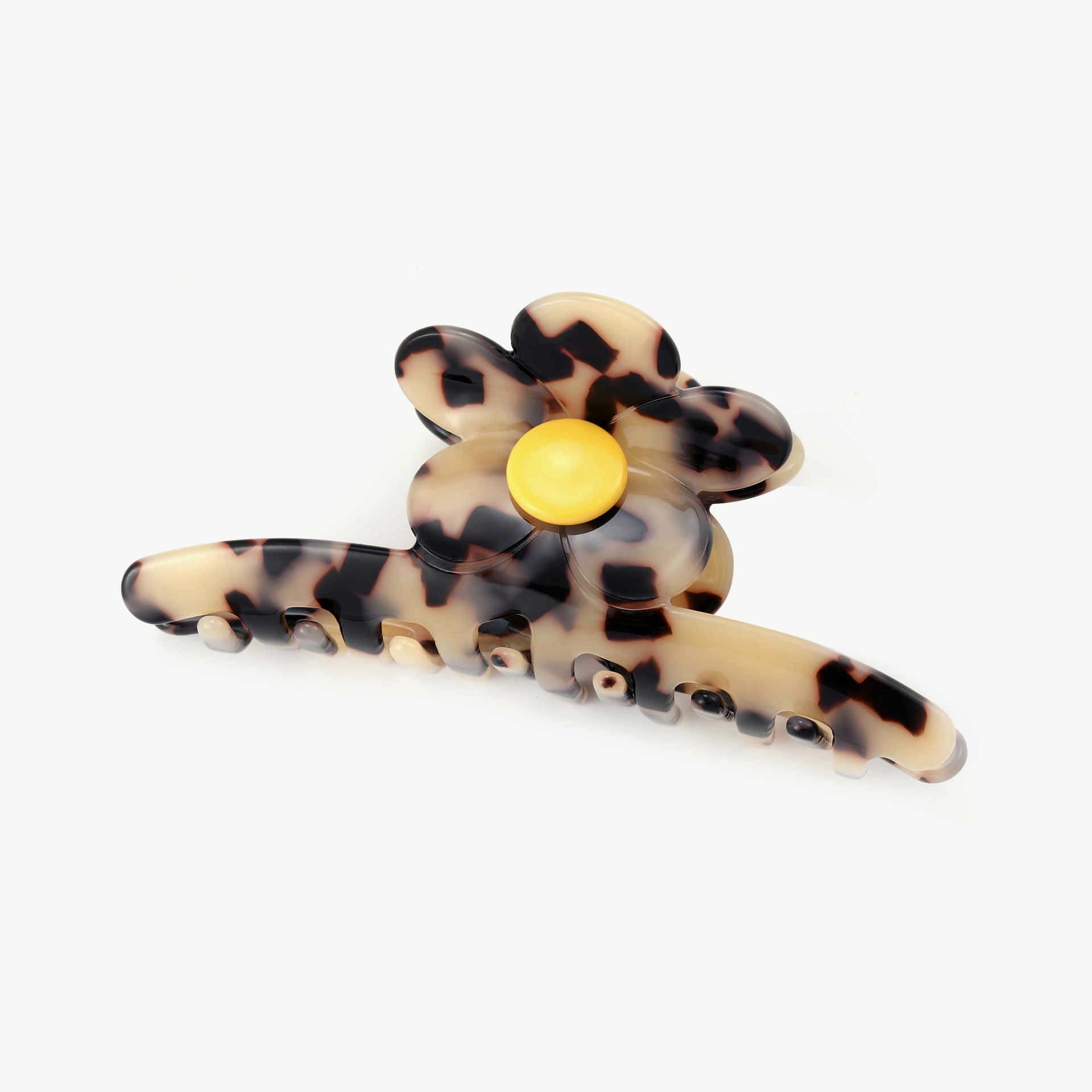 Giuno Eine Krallenklammer in Form eines langen Streifens mit Blumen