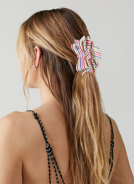 Haarschmuck in Schleifenform mit Smiley-Gesicht