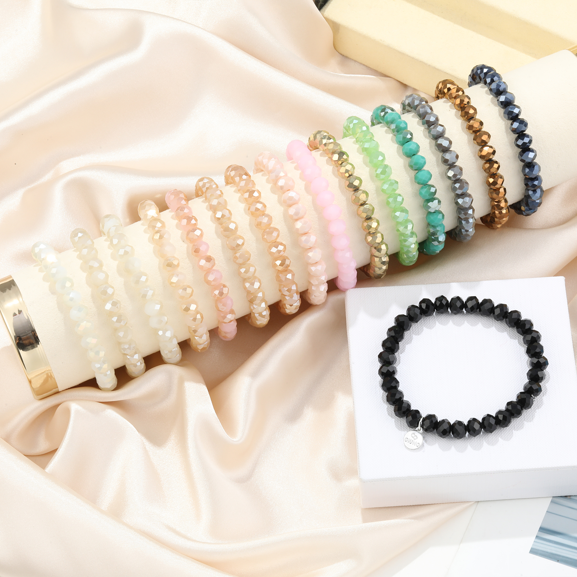 Elastisches Armband mit flacher Kristallperle